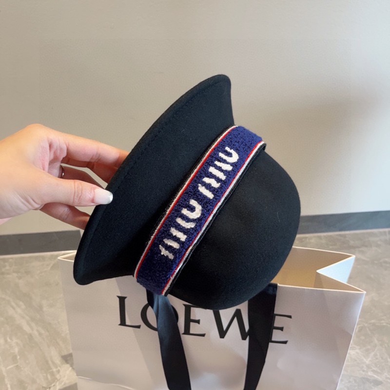 MiuMiu Bucket Hat